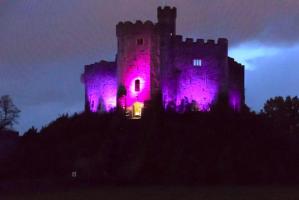 The Keep at Cardiff Castle lit up for Purple4Polio